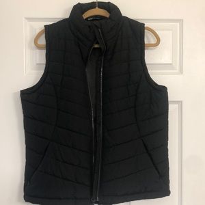 Women’s black puffer vest